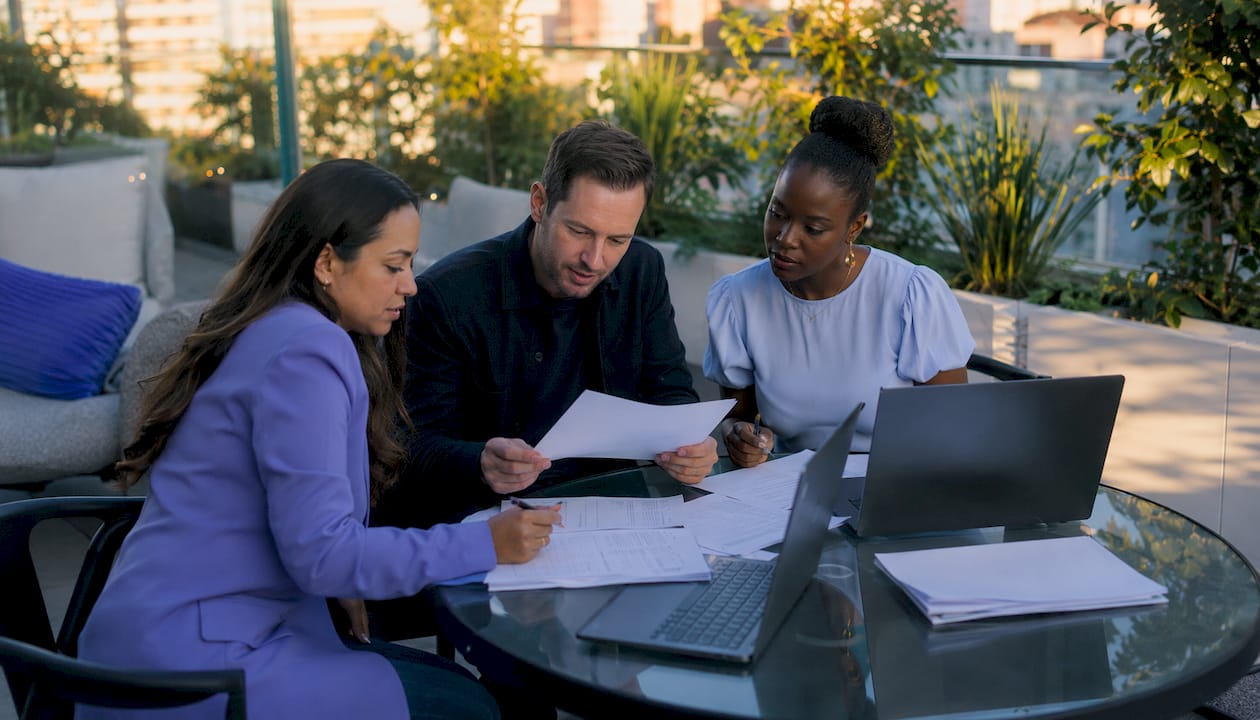 Team reviewing accounting documents collaboratively