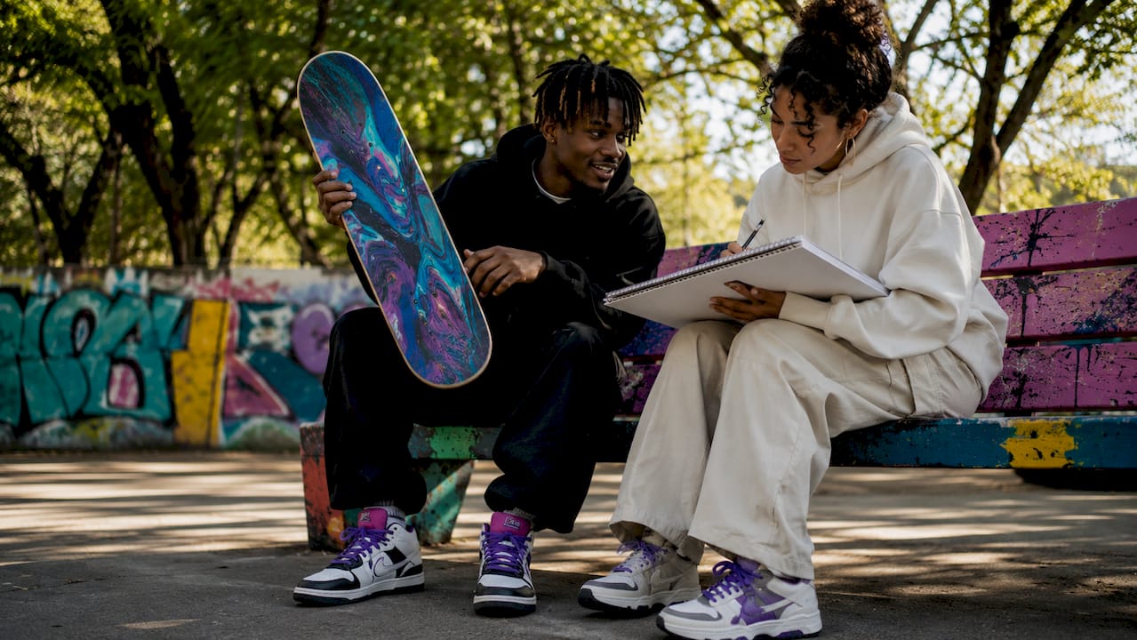 Group exchanging streetwear culture on urban street
