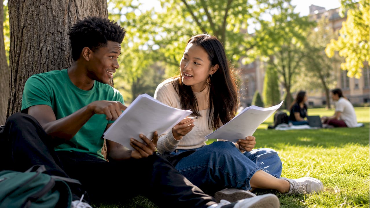 Students discussing practice test answers