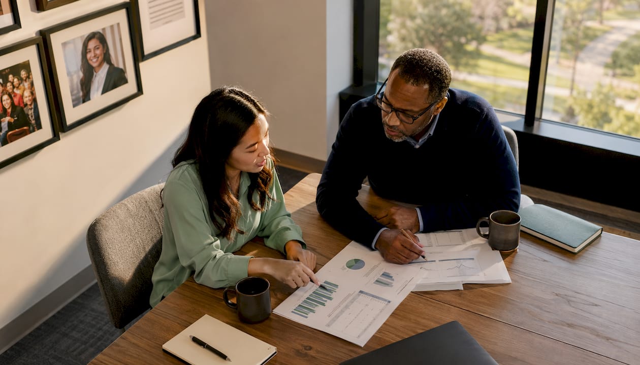Admissions officers discussing test score data