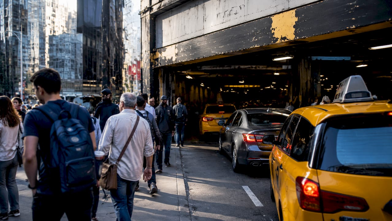 Crowded Manhattan parking garage entrance