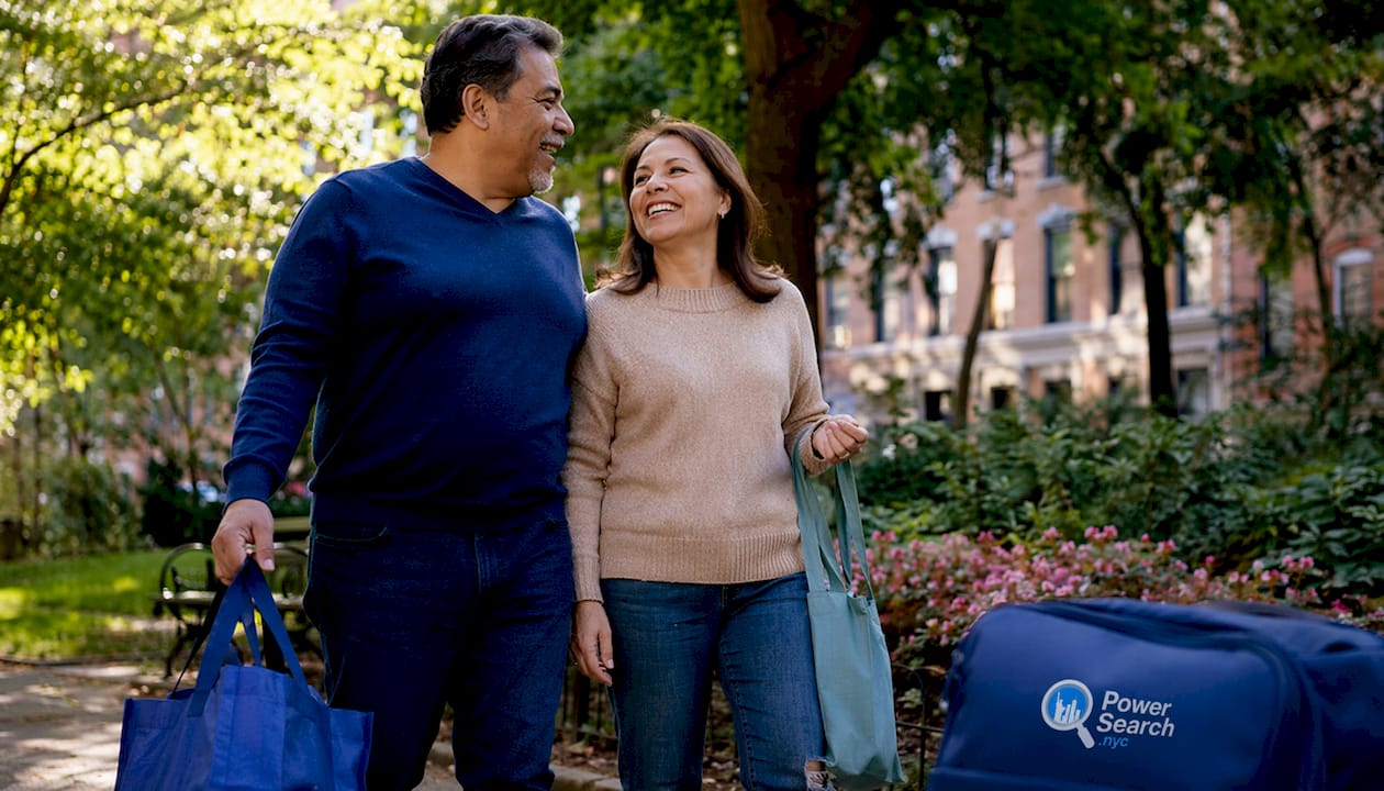 Couple exploring Chelsea neighborhood streets