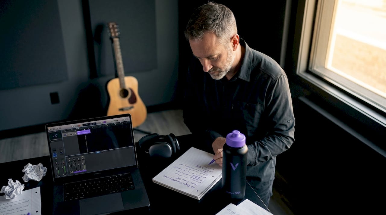 Engineer reviewing AU plugin compatibility notes