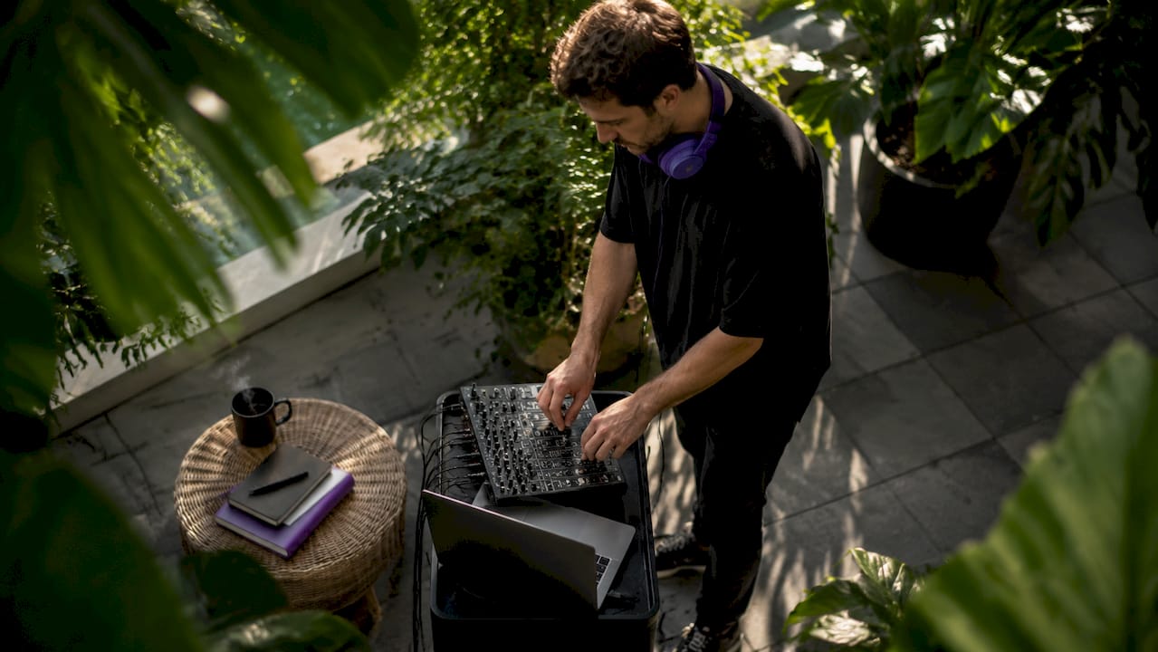 Audio engineer working with AAX plugins in Pro Tools studio