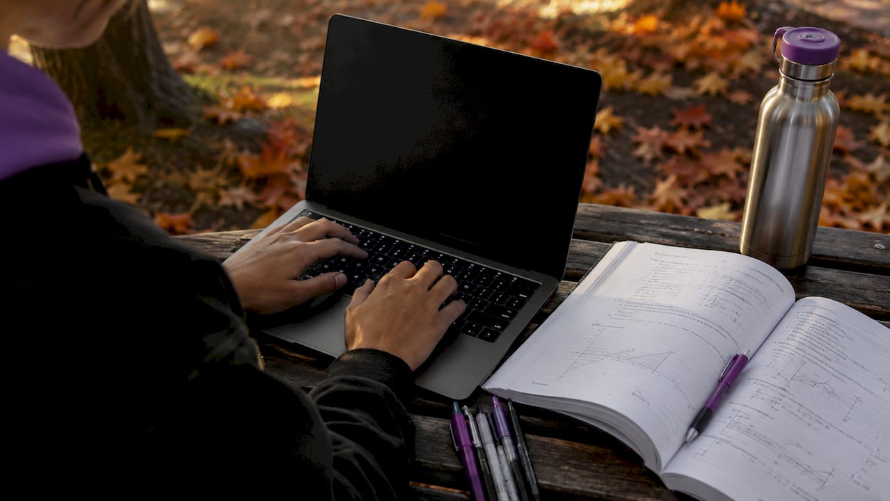 Hands typing DSP SIMD vectorization code at study desk