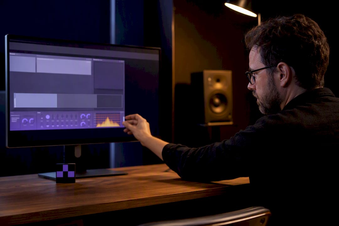Engineer testing a resizable audio plugin interface