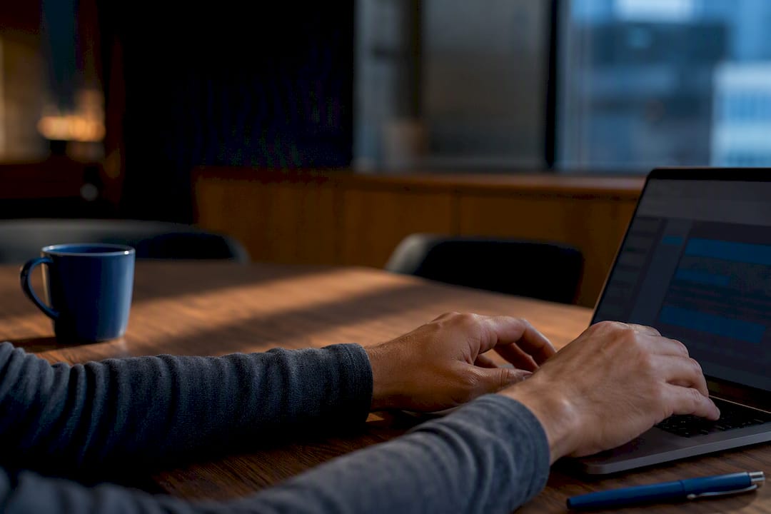 Hands moving team chat into email