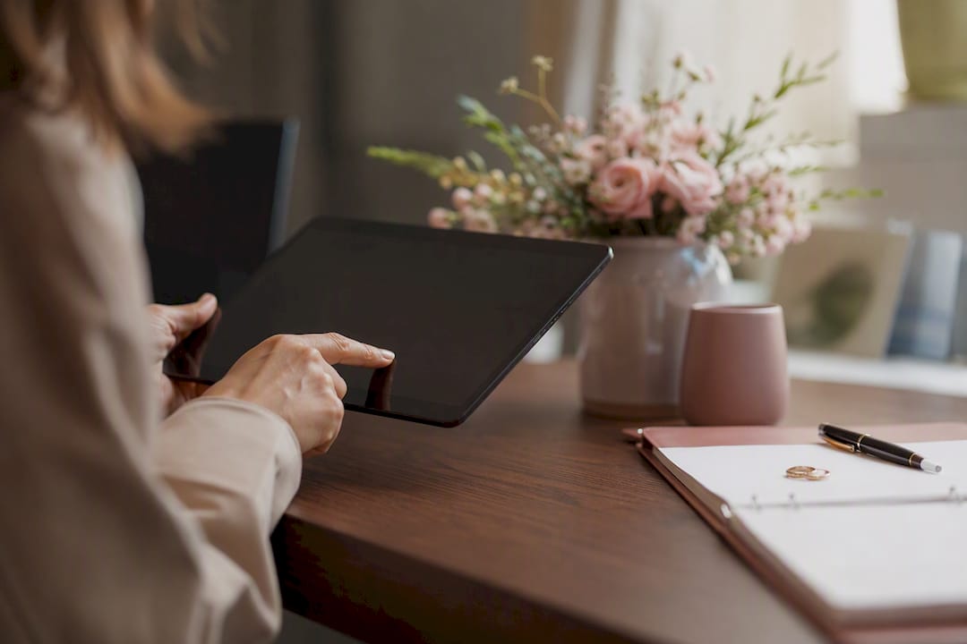 Hand confirming payment on a smartphone