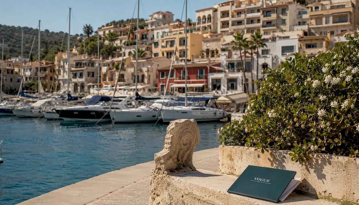 Harbour promenade with coastal properties and boats