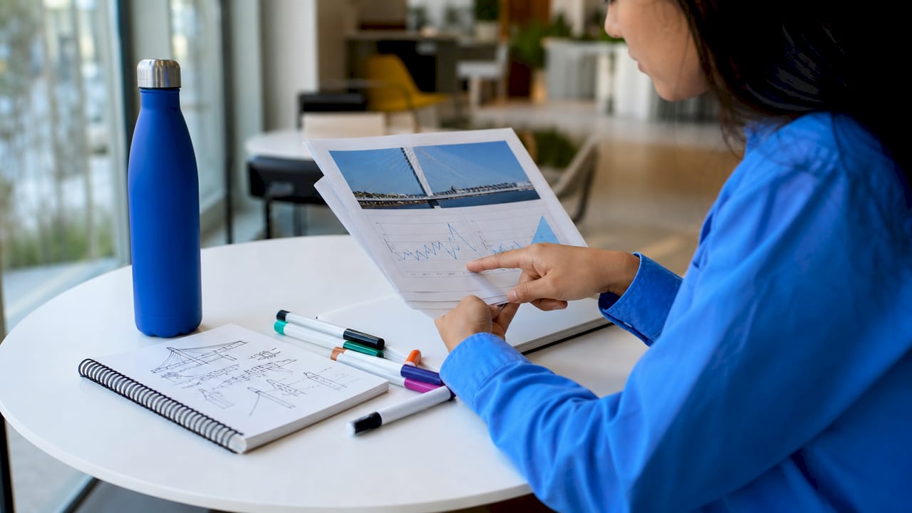 Engineer reviewing API infrastructure charts