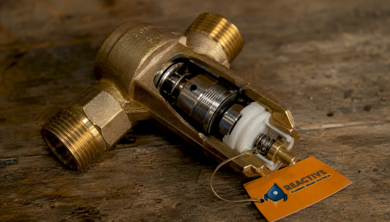 Close-up of thermostatic element inside tempering valve
