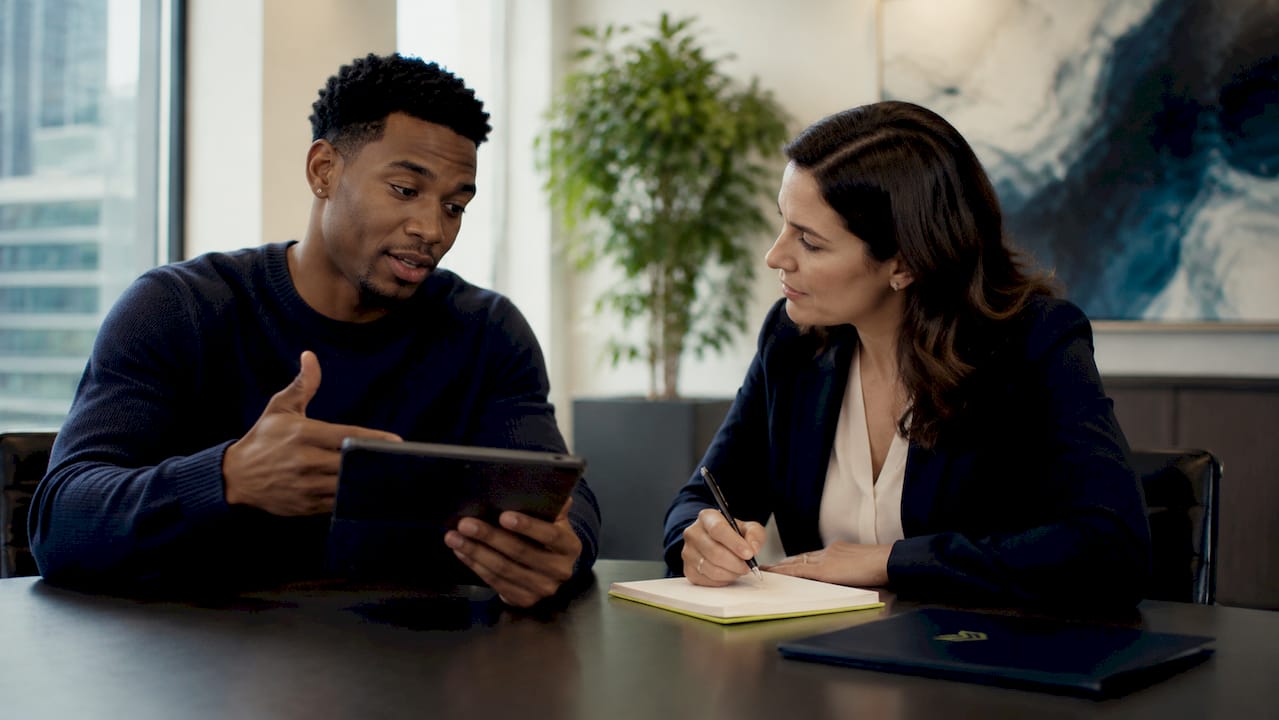 Financial advisor discussing mortgage rates with client