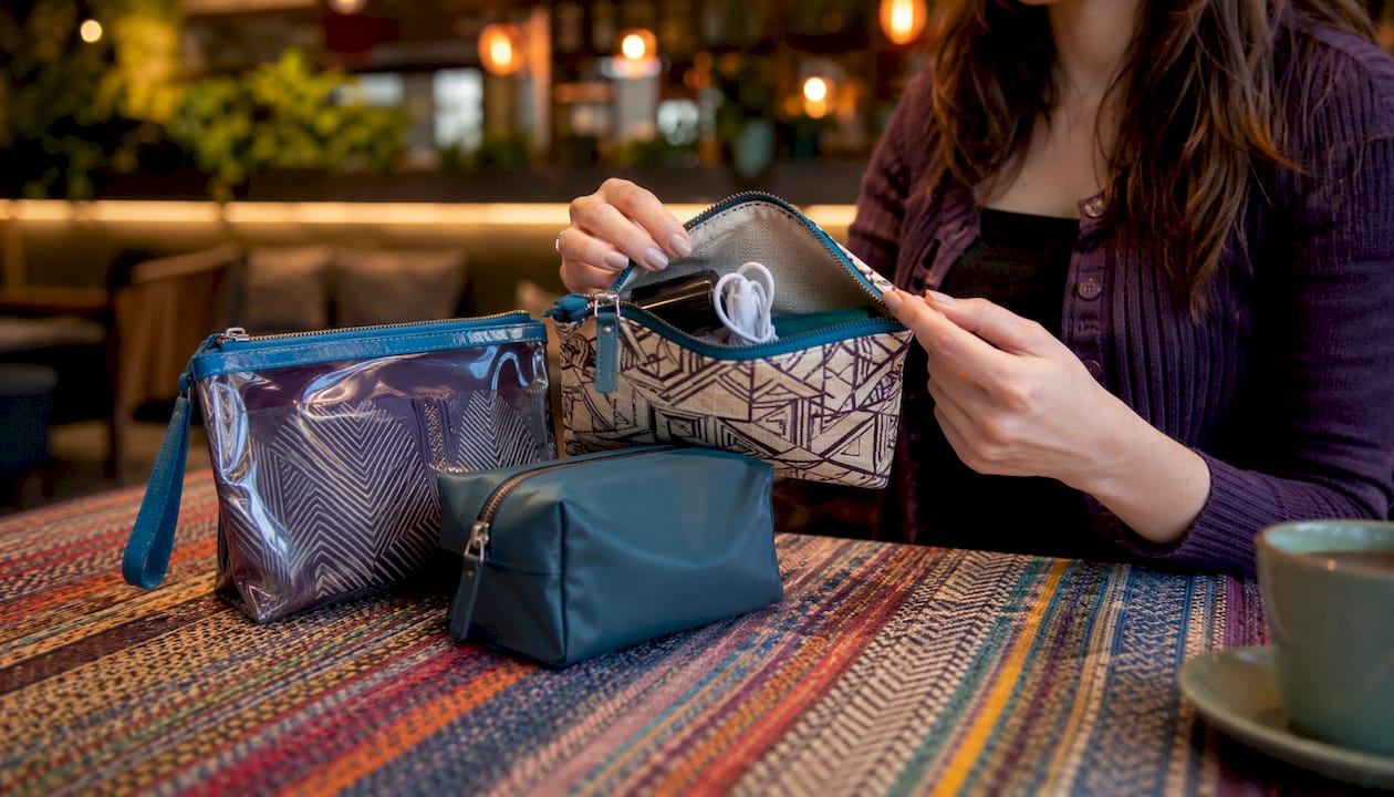 Selection of period kit pouches on countertop