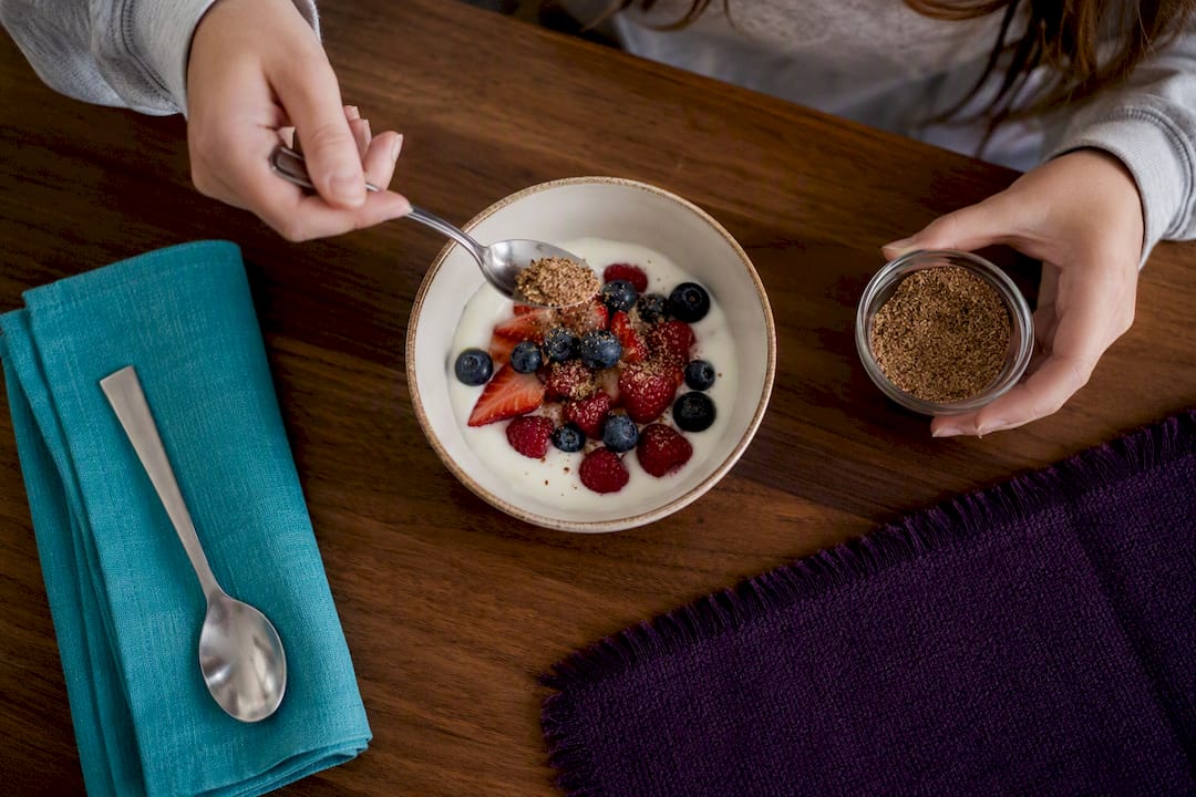 Yogurt bowl with berries and ground flaxseed