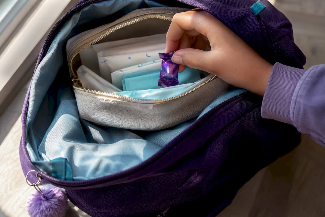 Candy tucked inside a discreet school period pouch