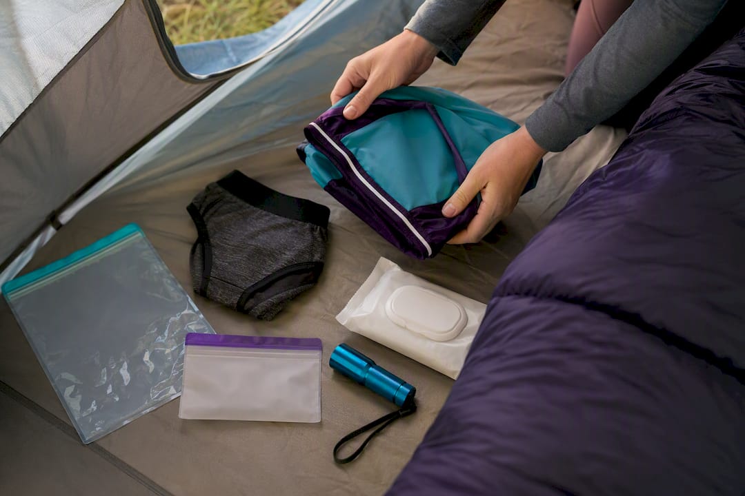 Travel leak kit arranged inside tent