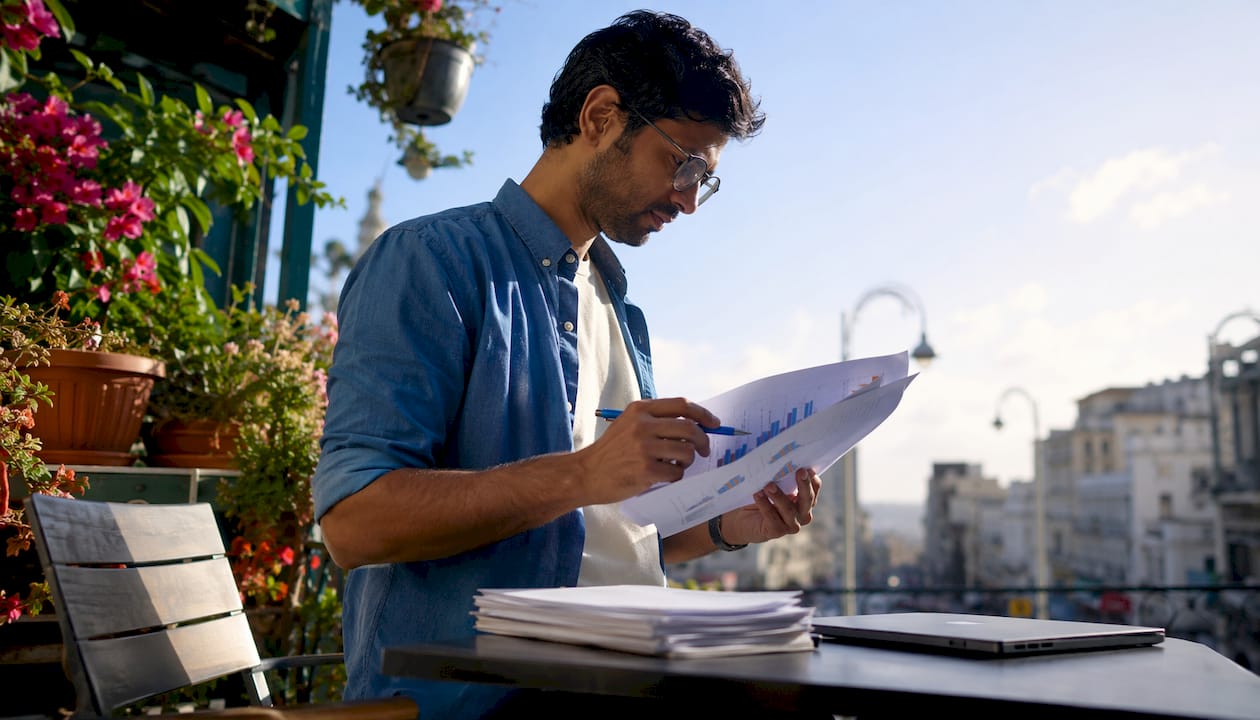 Data scientist reviewing AI model evaluation charts