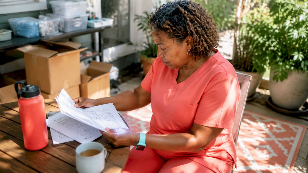 Woman reviewing medical donation paperwork