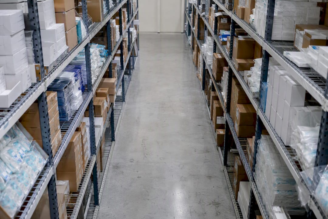 Medical supply warehouse shelves stocked