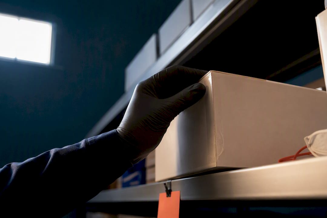 Anonymous respirator cartons on storage shelving