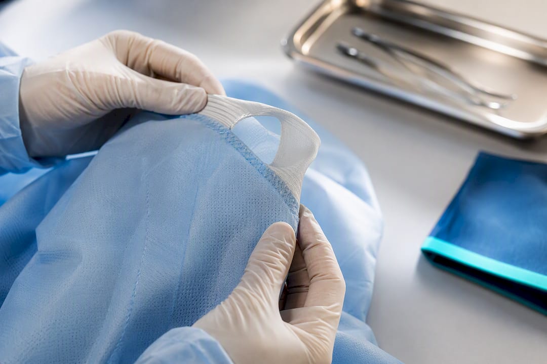 Close inspection of gown seam and cuff