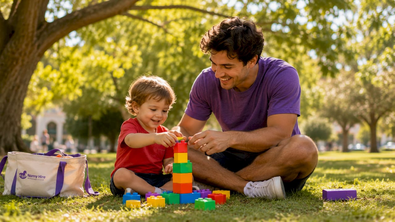 Nanny and toddler playing with blocks on floor