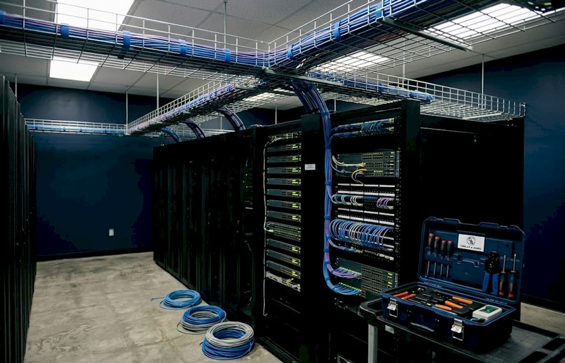 Wire mesh cable tray with routed cables