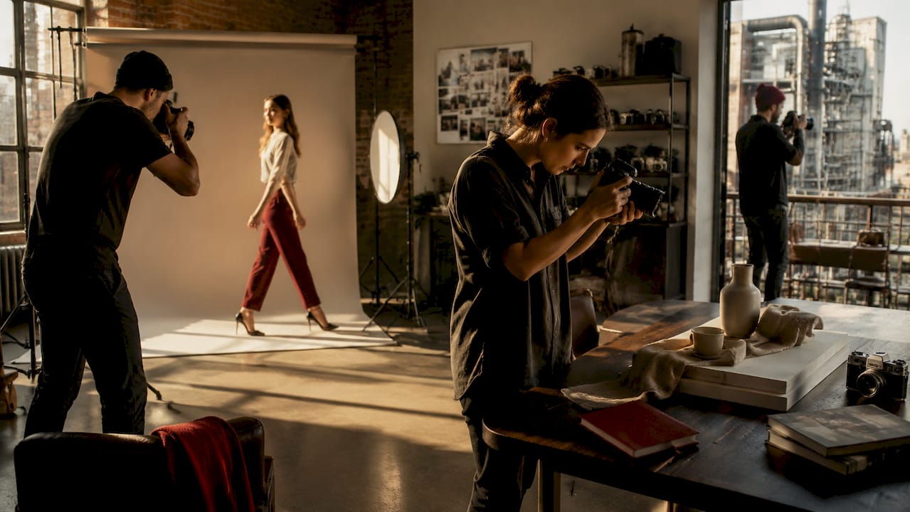 Photography studio scene with varied commercial shoots