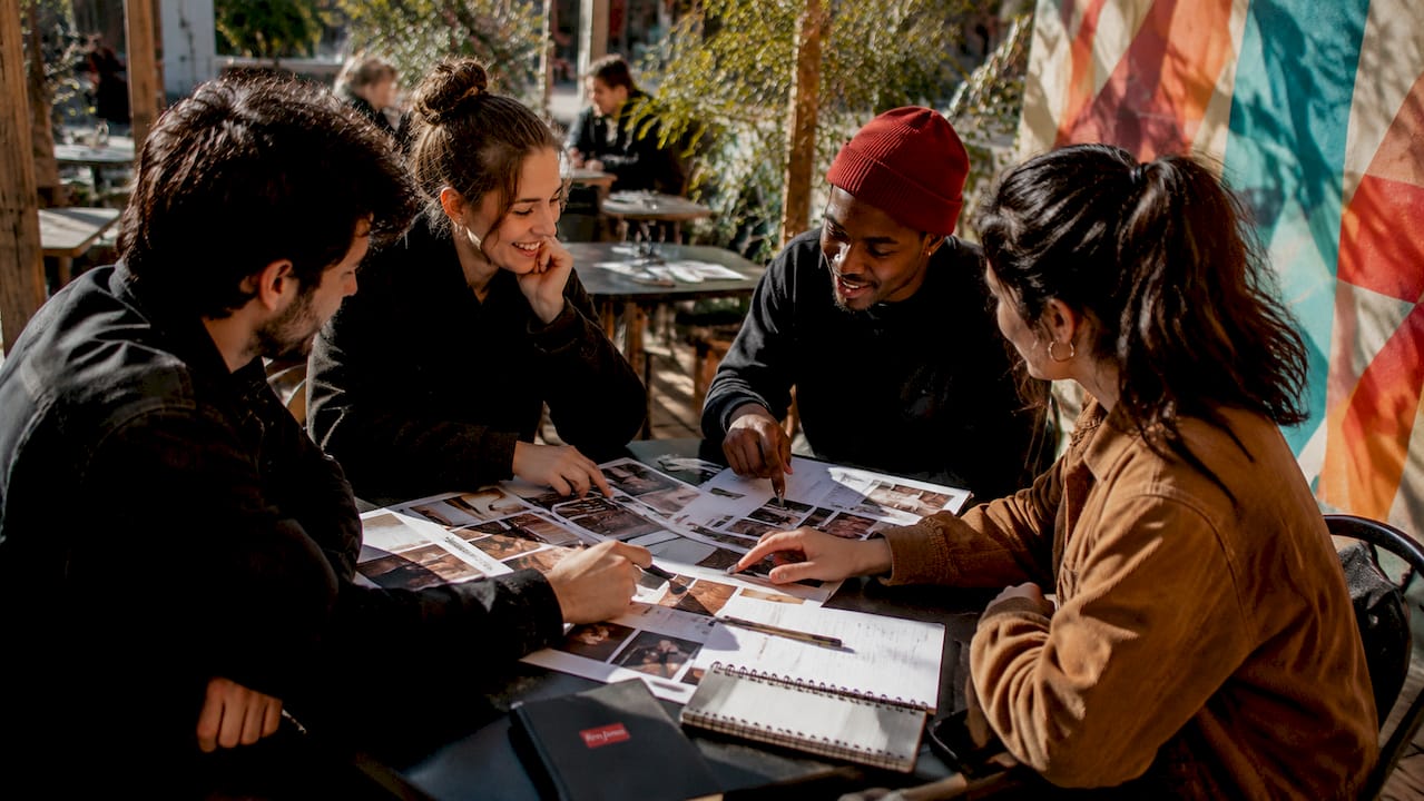 Creative team discussing mood board in NYC office