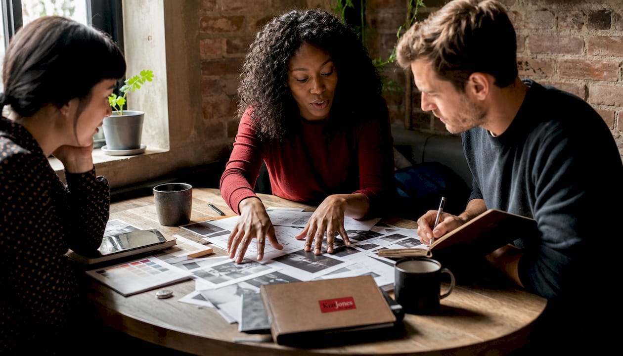 Creative team discussing photo shoot brief