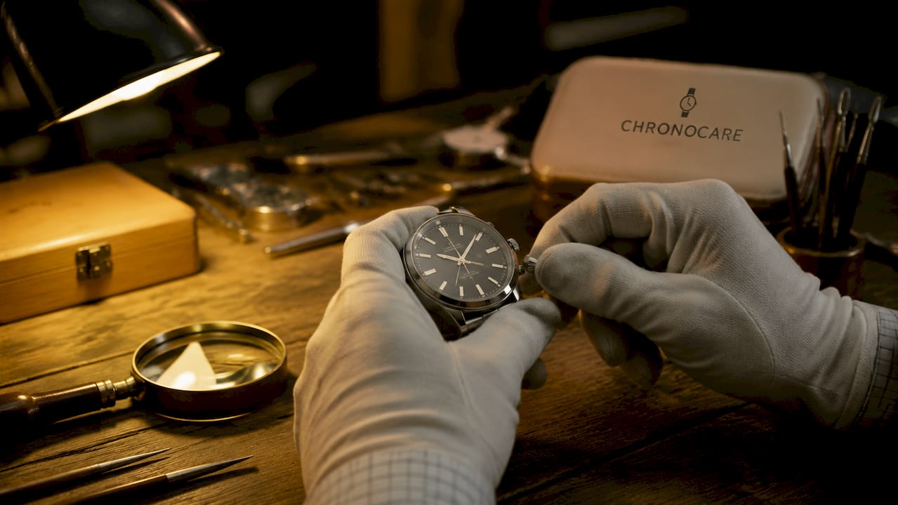 Close-up spinning watch crown in professional setting