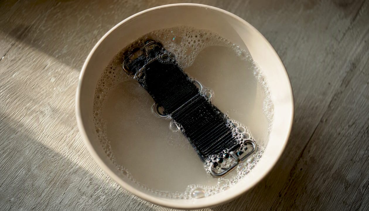 Nylon NATO strap soaking in mild soap water