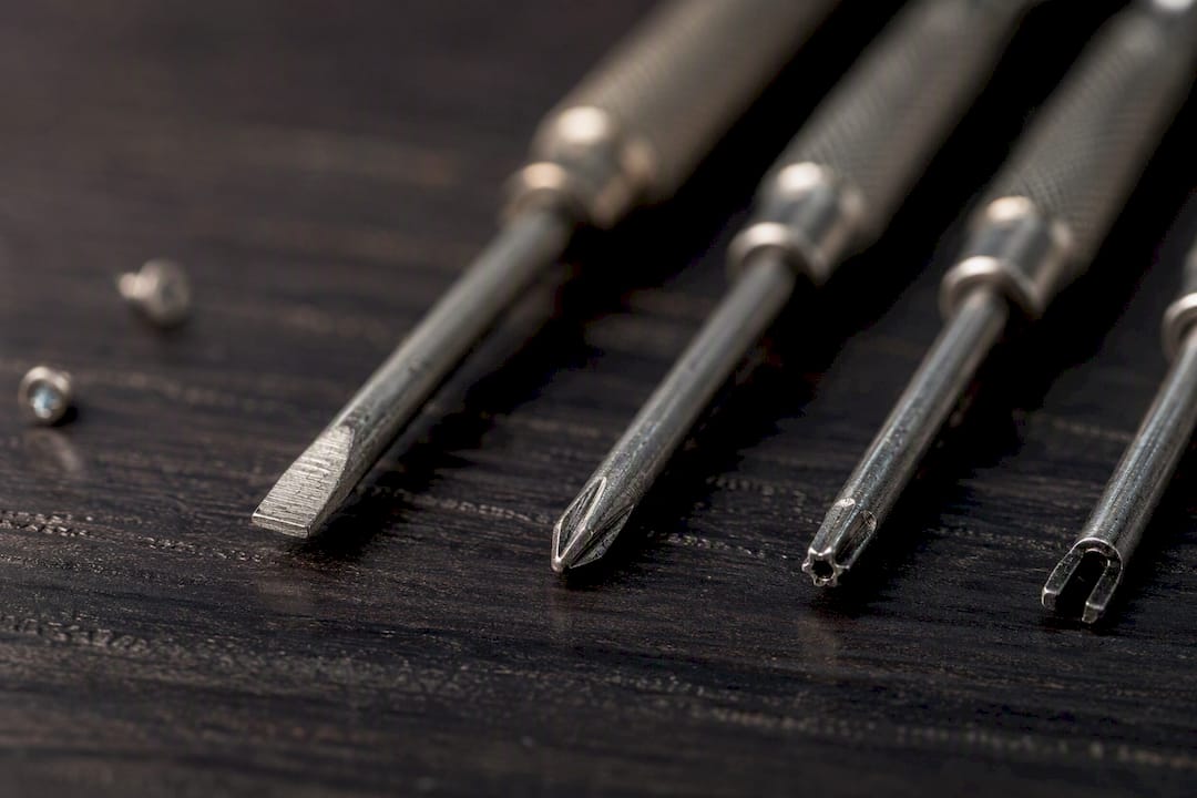 Various watch screwdriver tip types close-up