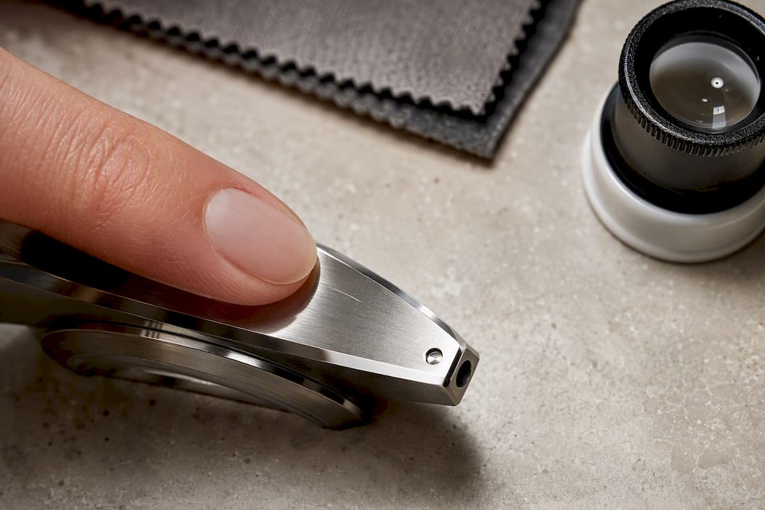 Fingernail testing shallow watch scratch