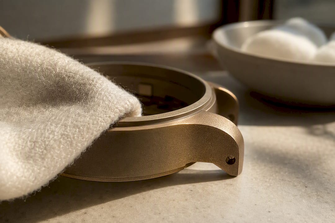 Soft cloth beside a matte bronze case texture