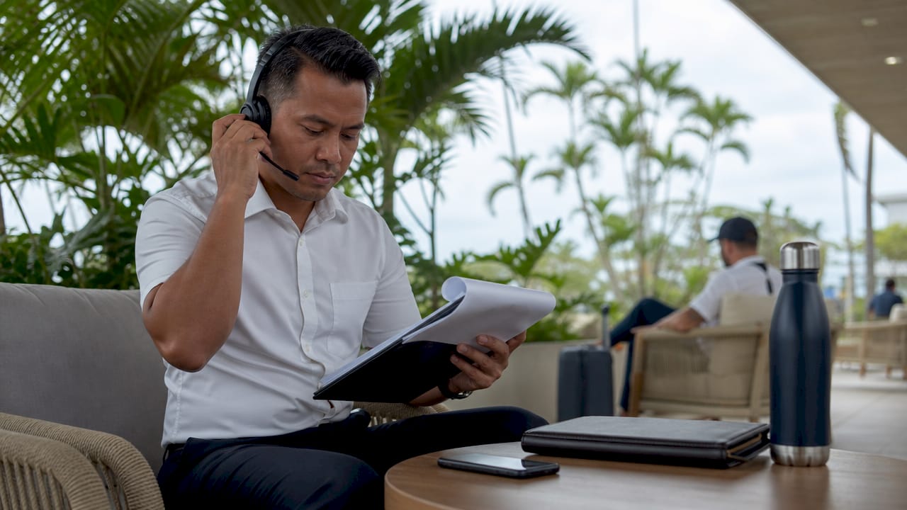VIP airport agent preparing arrival documents