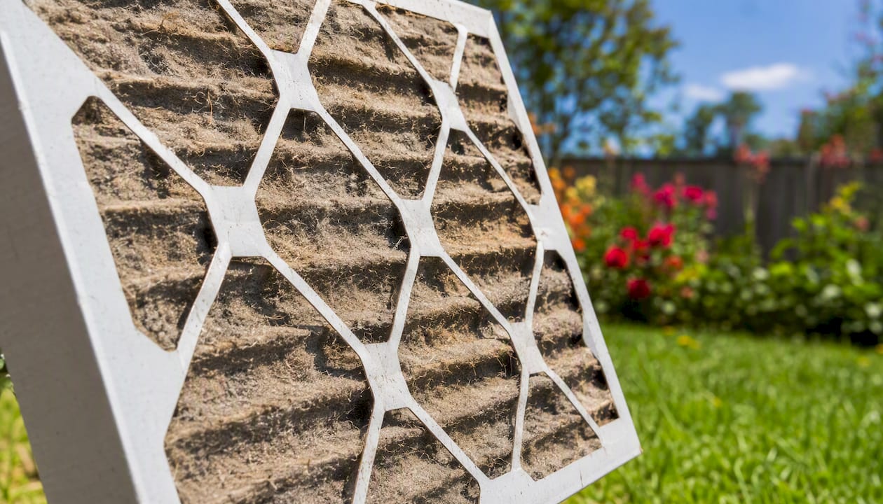 Close-up of dirty clogged AC air filter