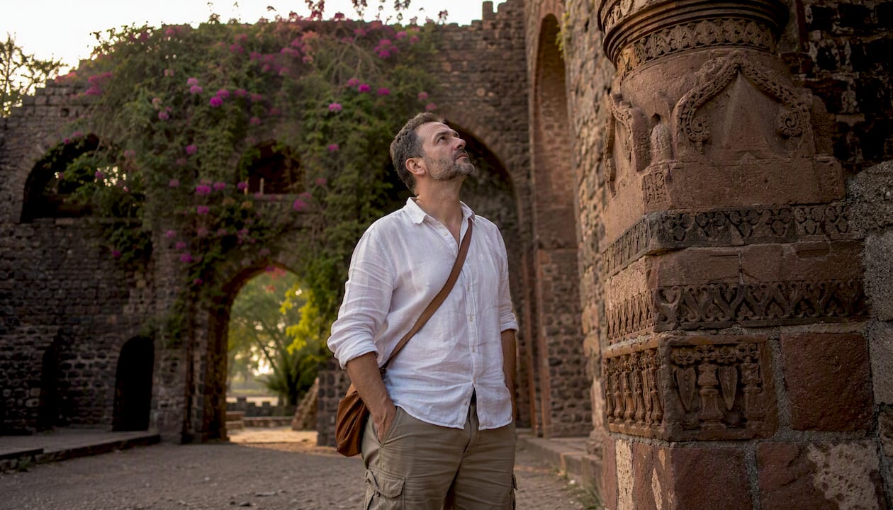 Traveler exploring Mandu ancient ruins