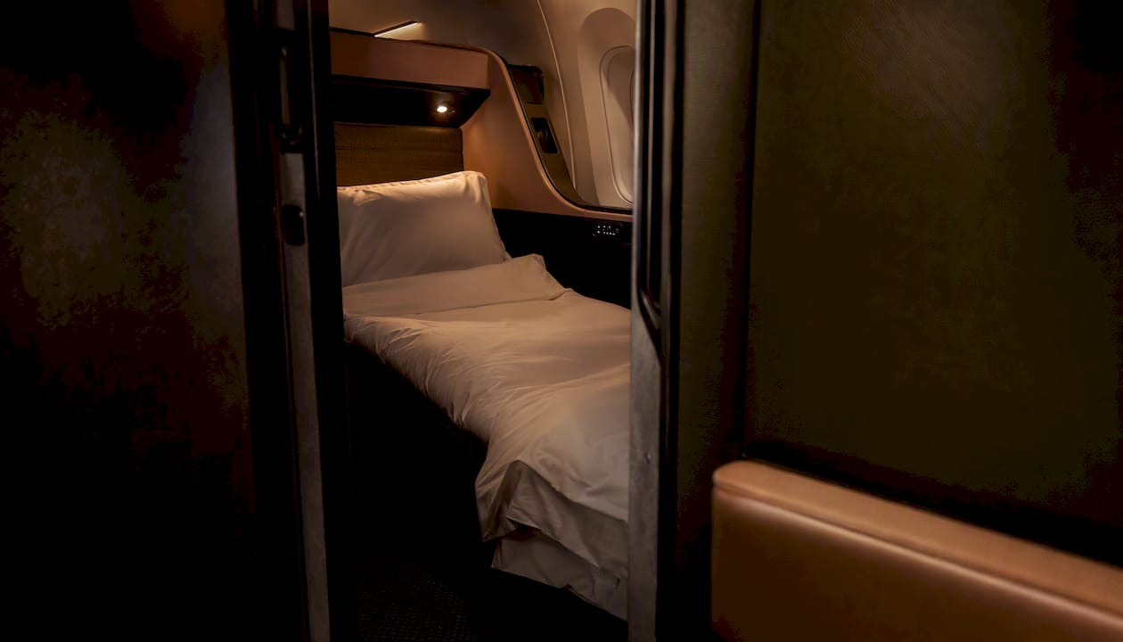 Enclosed business class suite with door interior