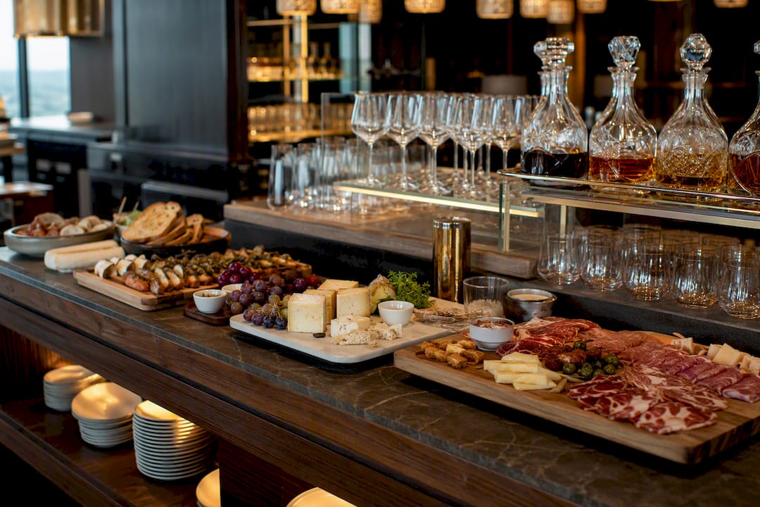 Luxurious airport lounge buffet and bar setup