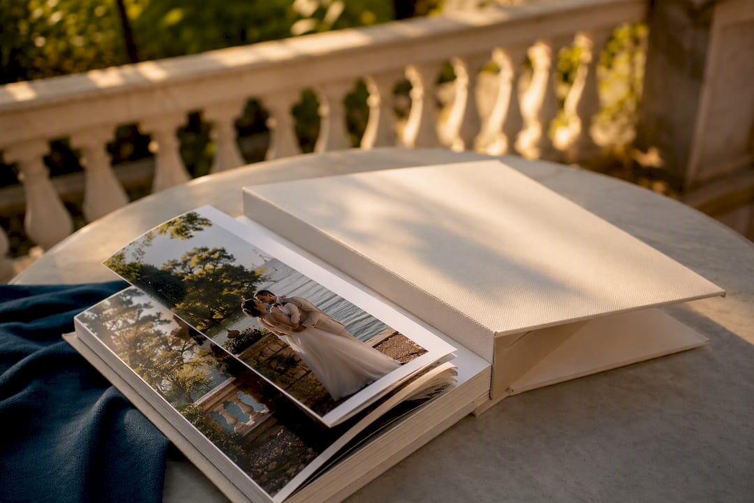 Close-up of wedding album cover and pages