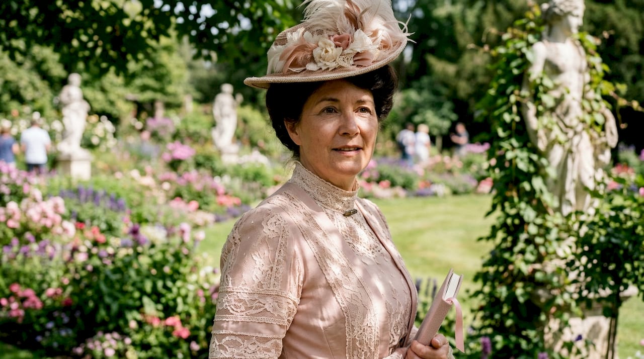 Close-up of woman in Victorian morning dress outdoors