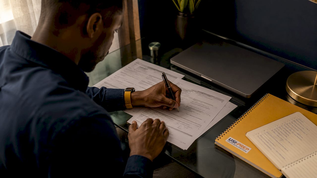 Hands completing Walmart Seller Center application forms