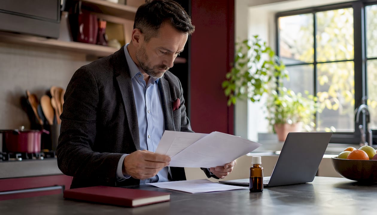 Quality officer reviewing regulatory documents