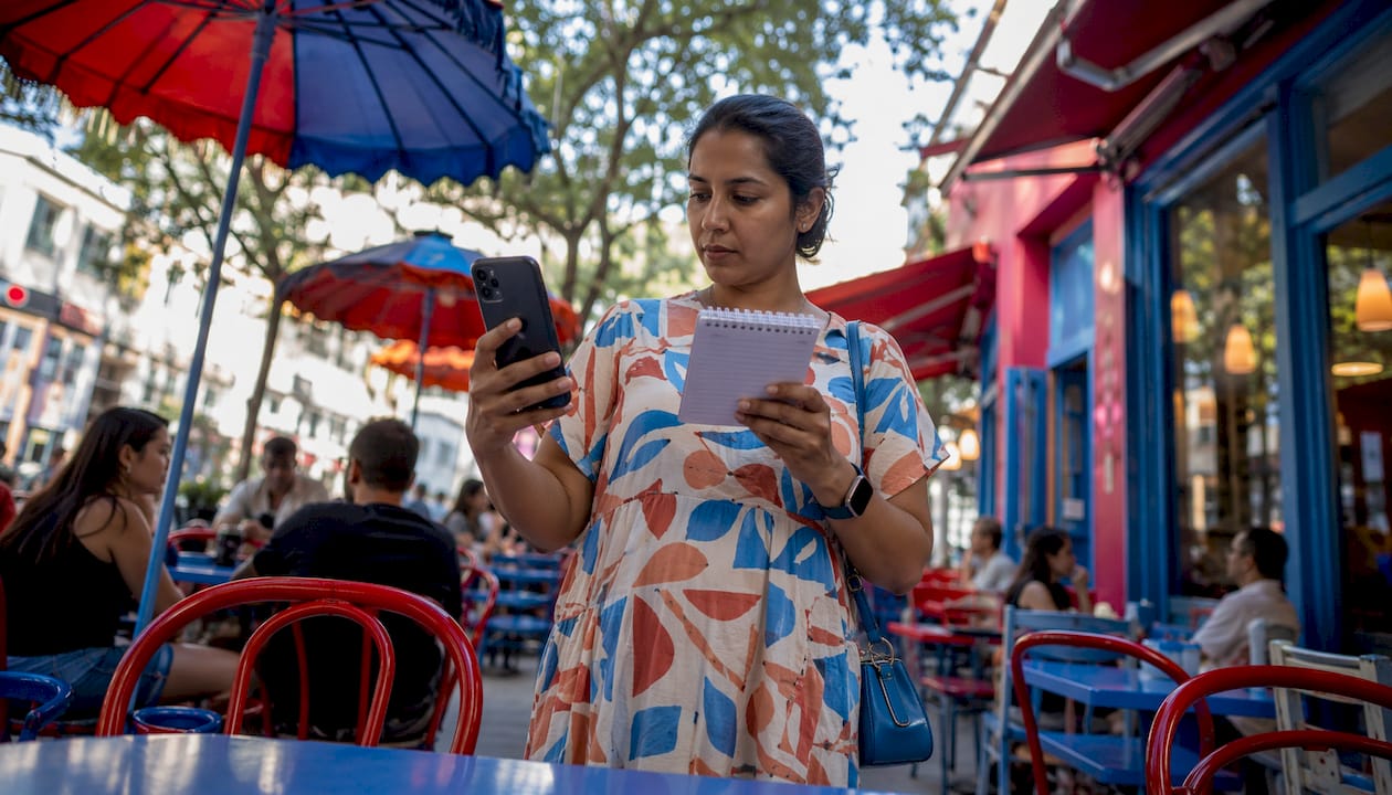 Woman managing Instagram follow list on phone and laptop