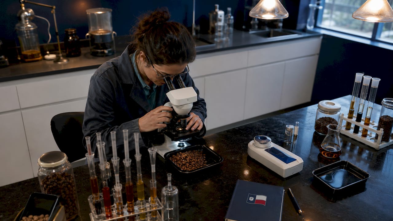 Coffee scientist analyzing coffee beans in laboratory