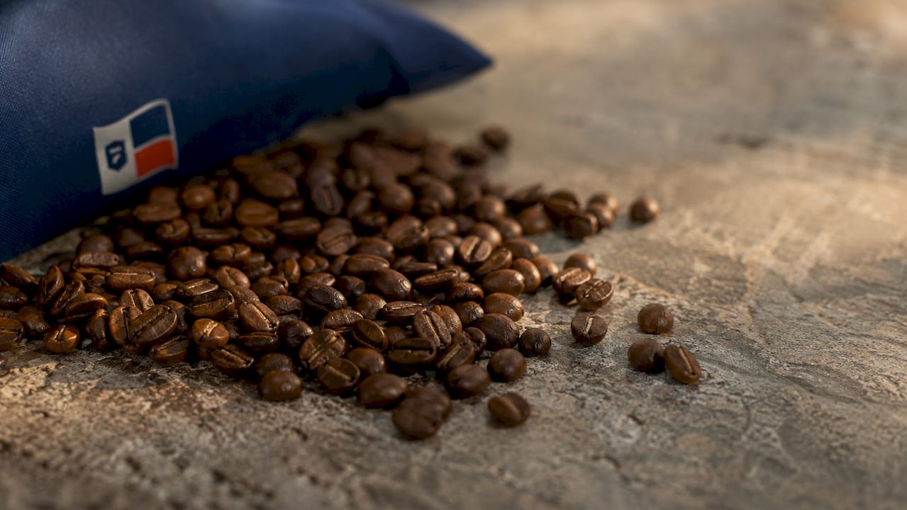 Close-up of textured roasted coffee beans