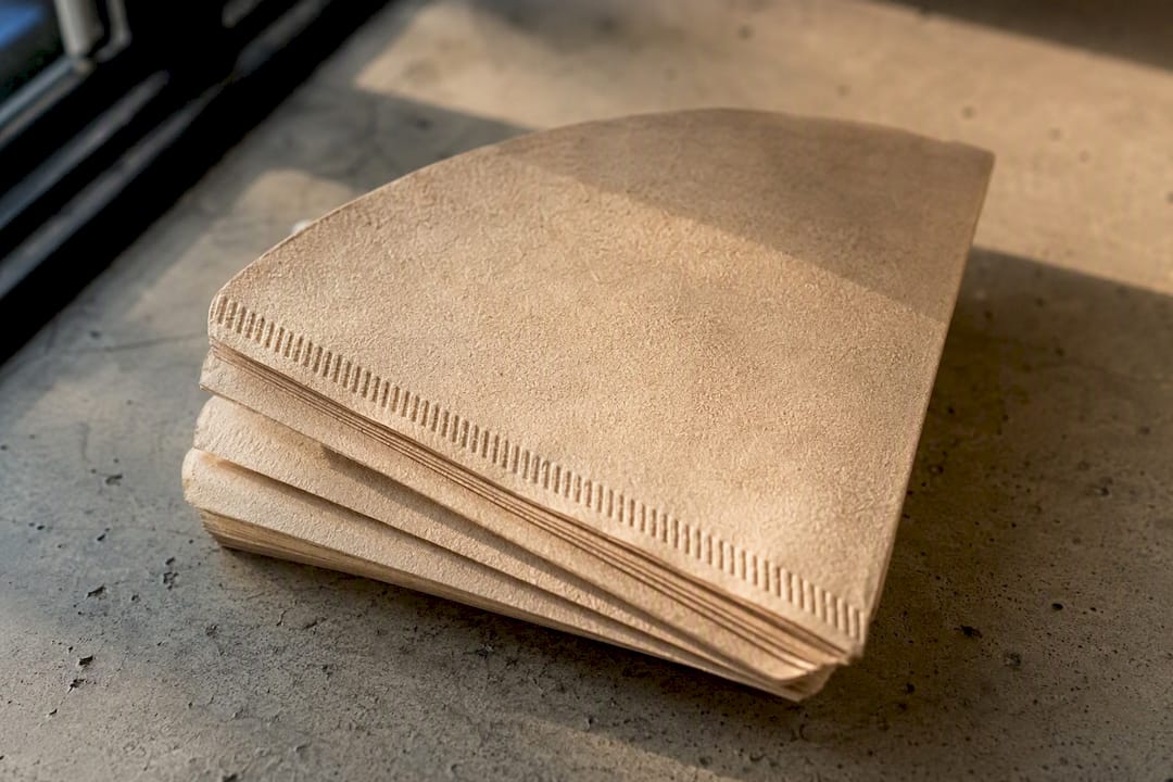 Stack of unbleached brown coffee filters