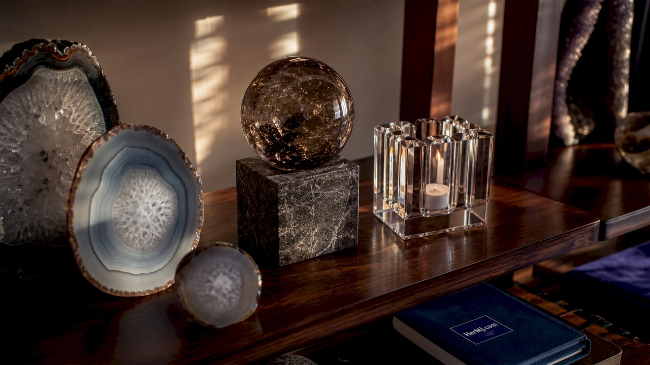 What Is Crystal Decor? A Home Design Guide Close-up of assorted crystal decor pieces on shelf