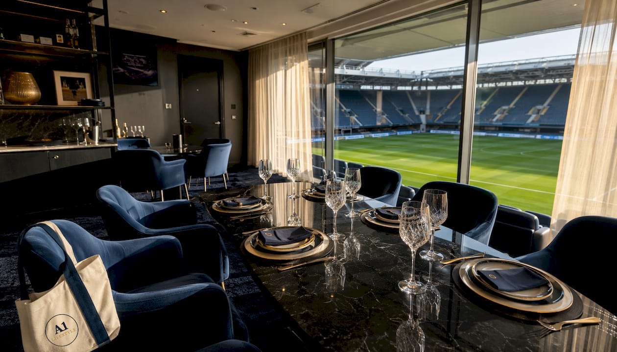Empty premium sports hospitality box interior